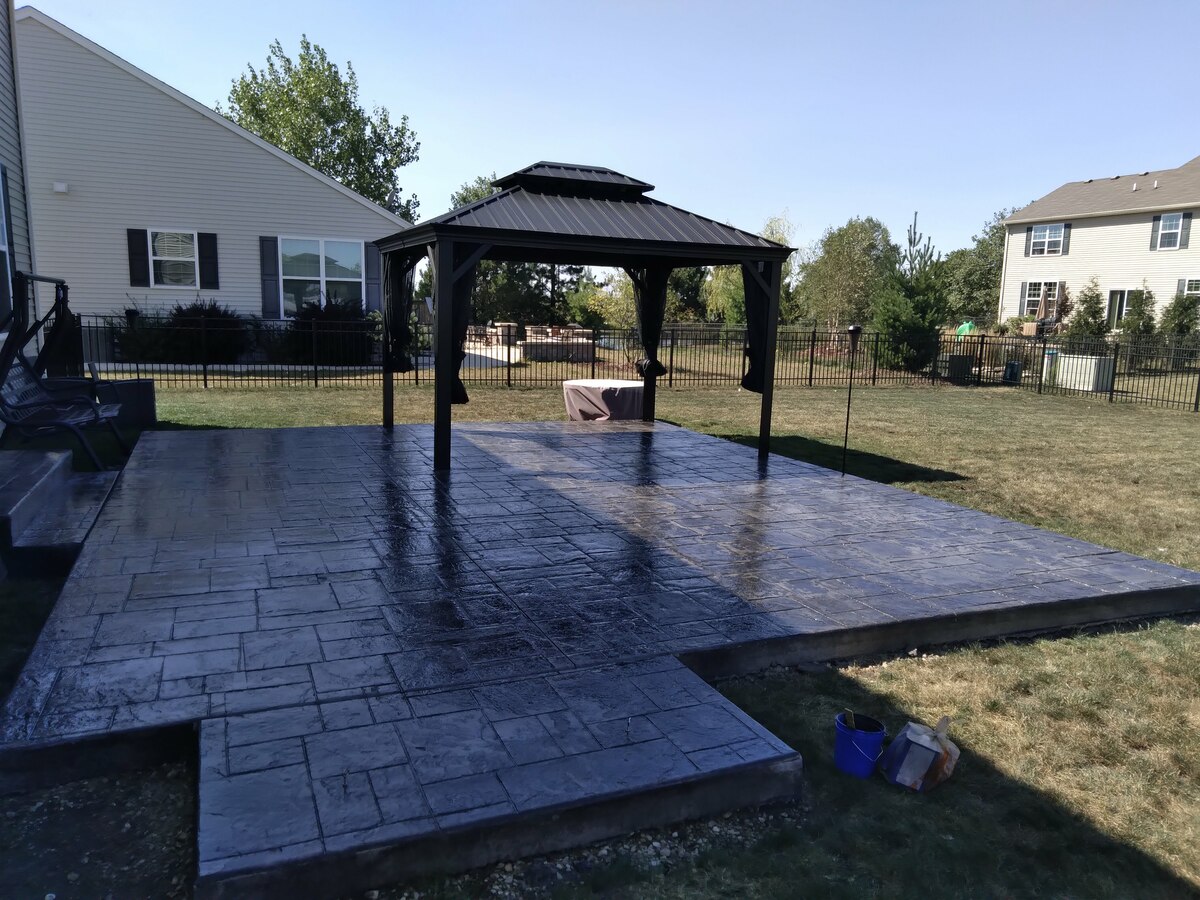 Stamped concrete patio with a gazebo